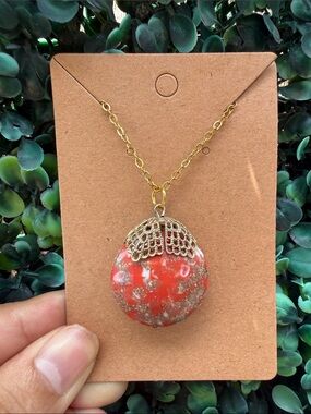 Gold-Tone Necklace with Red Orange Marbled Pendant